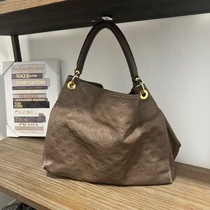 Louis Vuitton Artsy tote.